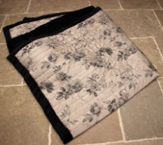 A Dorma super king quilt, the grey foliate fabric with black velour trim, 180cm x 200cm