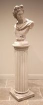 A composite simulated stone pedestal column and bust, the column of typical fluted form, along