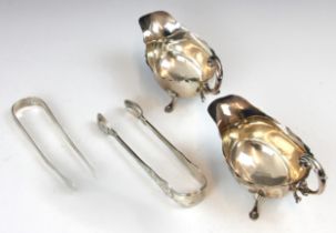 A pair of silver sauce boats, S Blanckensee & Son Ltd, Birmingham 1939, each with cusped rims and