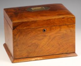 An Edwardian figured walnut work box, the gently domed cover inset with a swing handle and