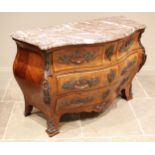 A French Louis XV style kingwood marble topped bombe commode chest, early to mid 20th century, the