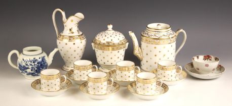 An empire style porcelain tea or coffee service, 19th century, each piece with gilt spot and star