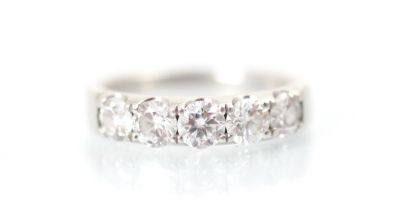 A Mappin & Webb platinum five stone diamond ring, the five round cut diamonds claw set within a