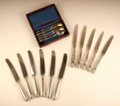 A set of five Kings pattern silver coloured table knives,