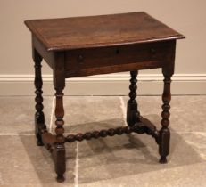 An 18th century oak side table, the rectangular moulded top above a single pine lined drawer,