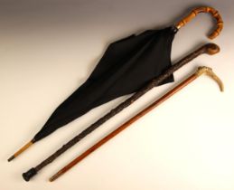 A Victorian ‘18ct’ collared parasol, stamped '18ct gp' 90cm high, with an antler handled crop, 67.