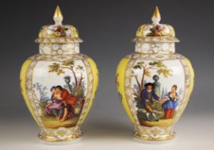 A pair of Augustus Rex porcelain vases and covers, 19th century, of ovoid form, each polychrome