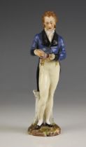 A German porcelain figure of a Gentleman, 19th century, modelled standing bedsides a marbled column,