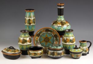 A selection of nine Dutch Gouda pottery vessels, 20th century, to include: a pair of vases, of ovoid