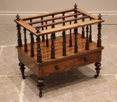 A Victorian walnut Canterbury, the spindled dividers and three compartments over a single frieze