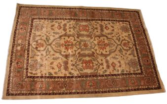 A Persian Heriz silk/wool rug, the all over foliate design in subtle shades of peach, green and