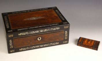 A Victorian rosewood veneered writing slope, mid 19th century, of typical form, the hinged cover