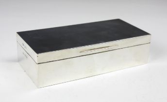 A George VI silver cigarette box, Padgett and Braham Ltd, London 1937, the hinged cover with