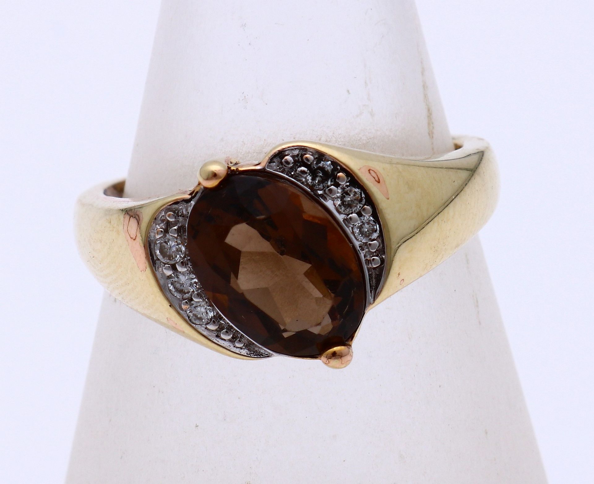 Gold ring with smoky quartz and diamond