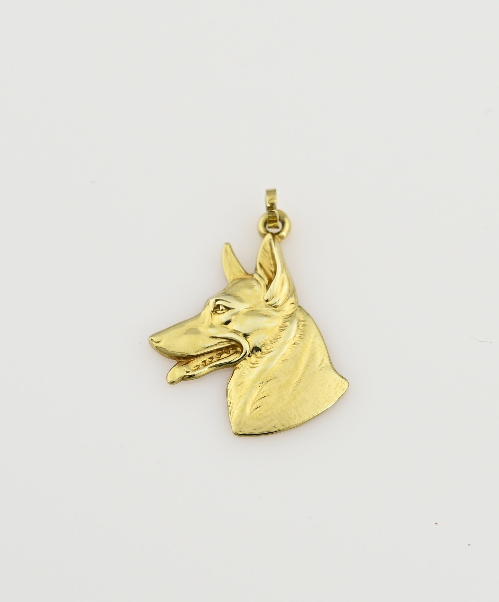 Gold dog pendant