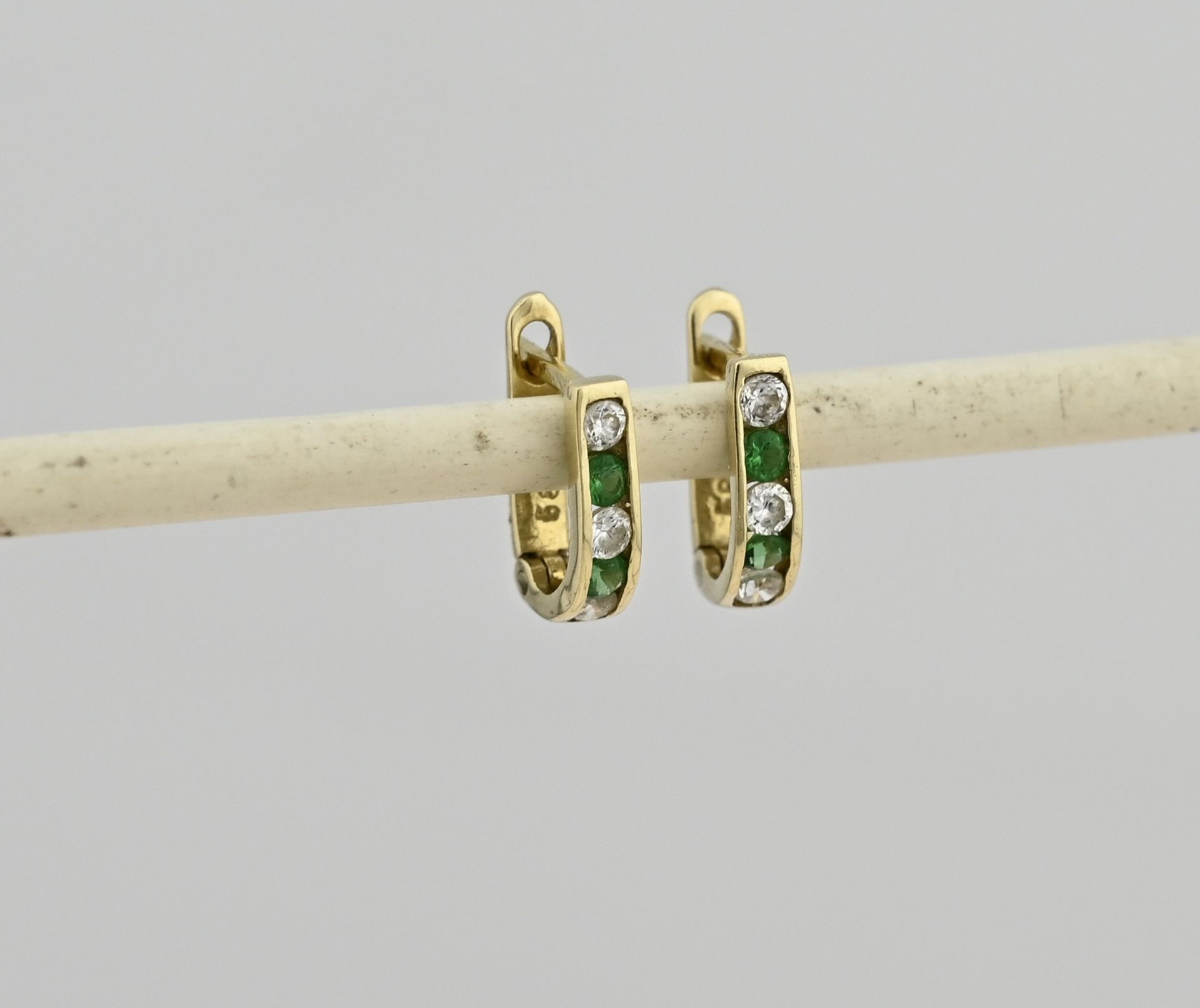 Gold creoles with green