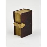 Bible with gold lock