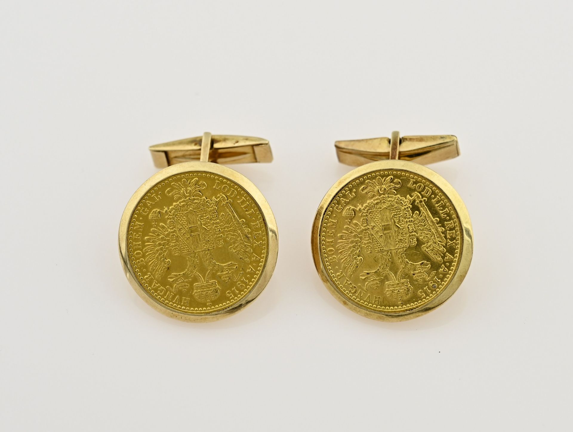 Gold cufflinks with ducats