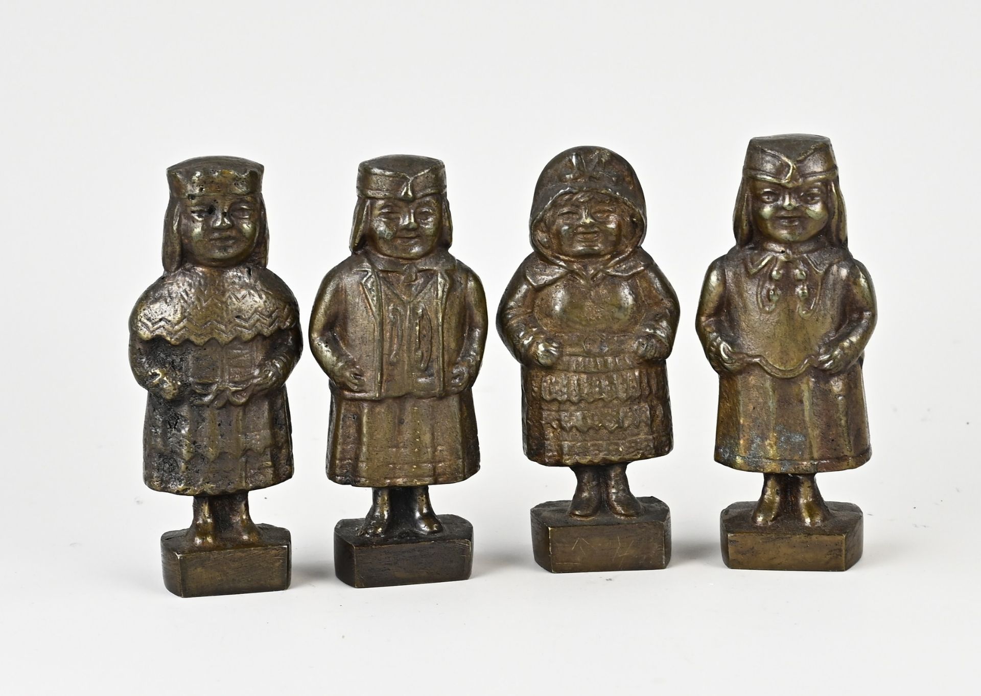 Four bronze figures