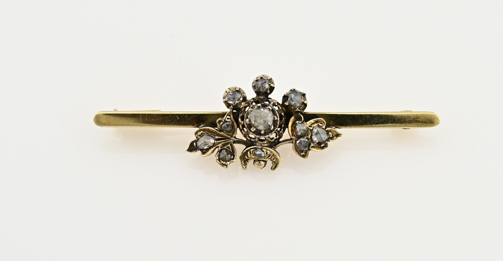 Gold brooch with rose diamond