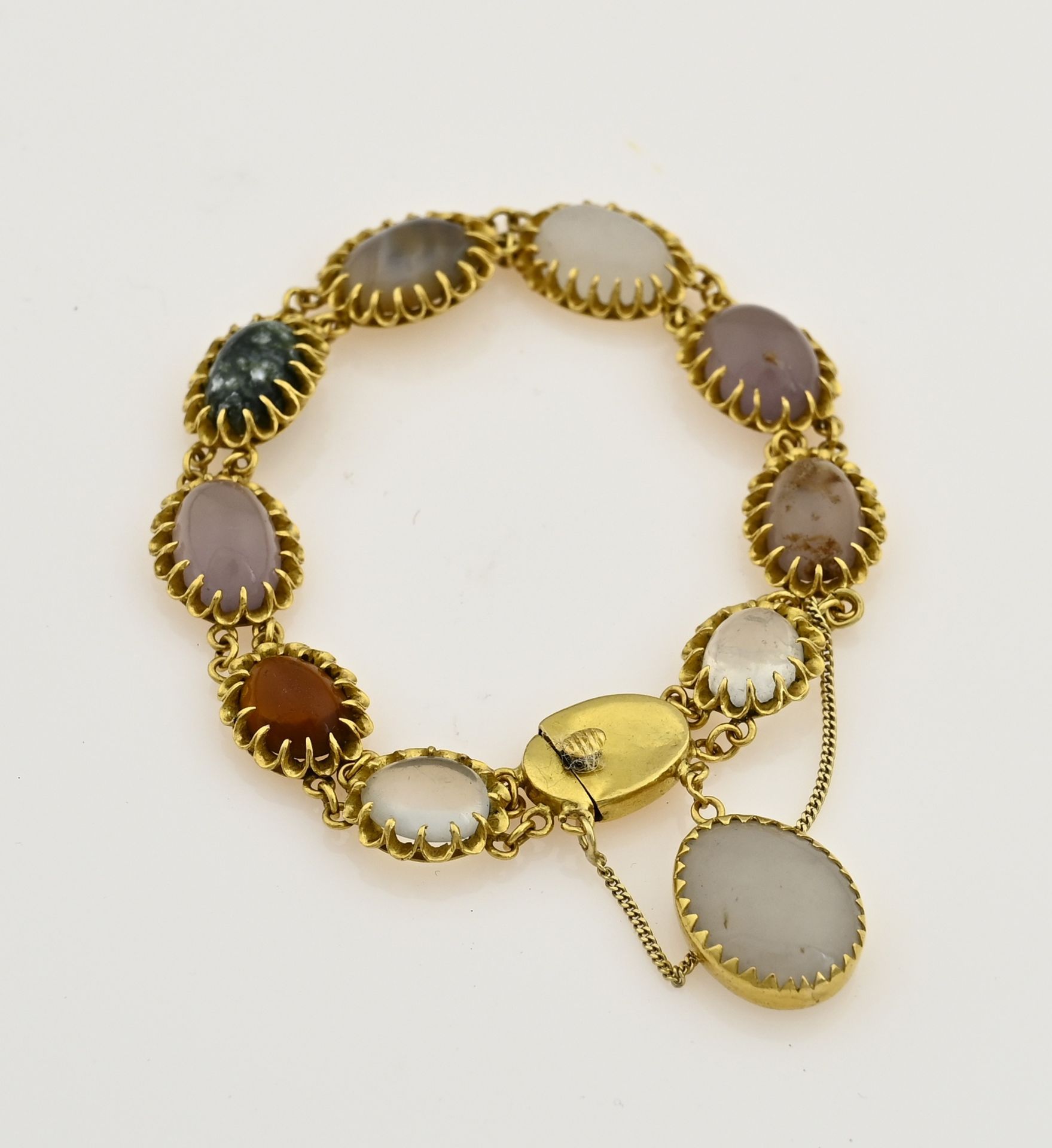 Gold bracelet with gemstones