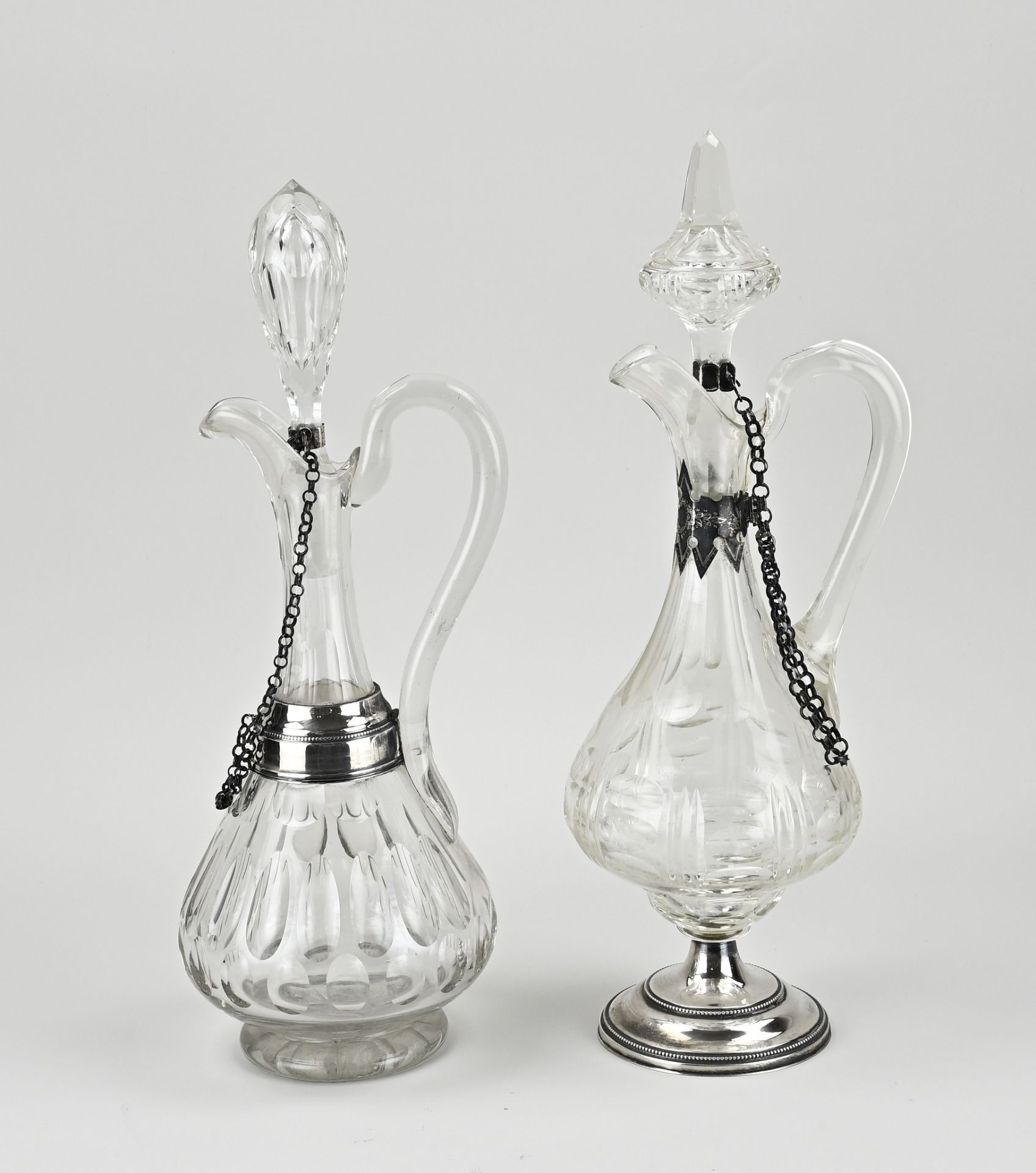 2 decanters with silver