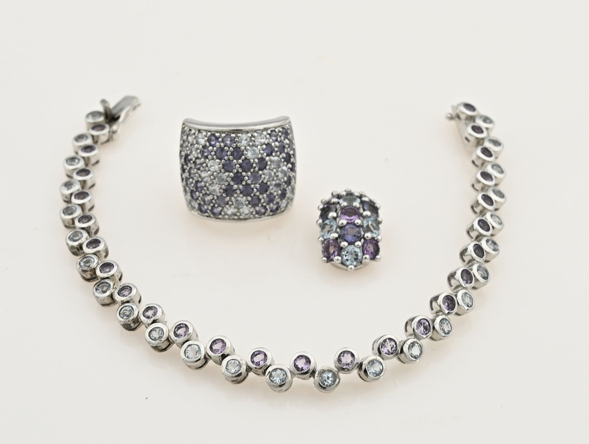 Set of silver jewelry with precious stones