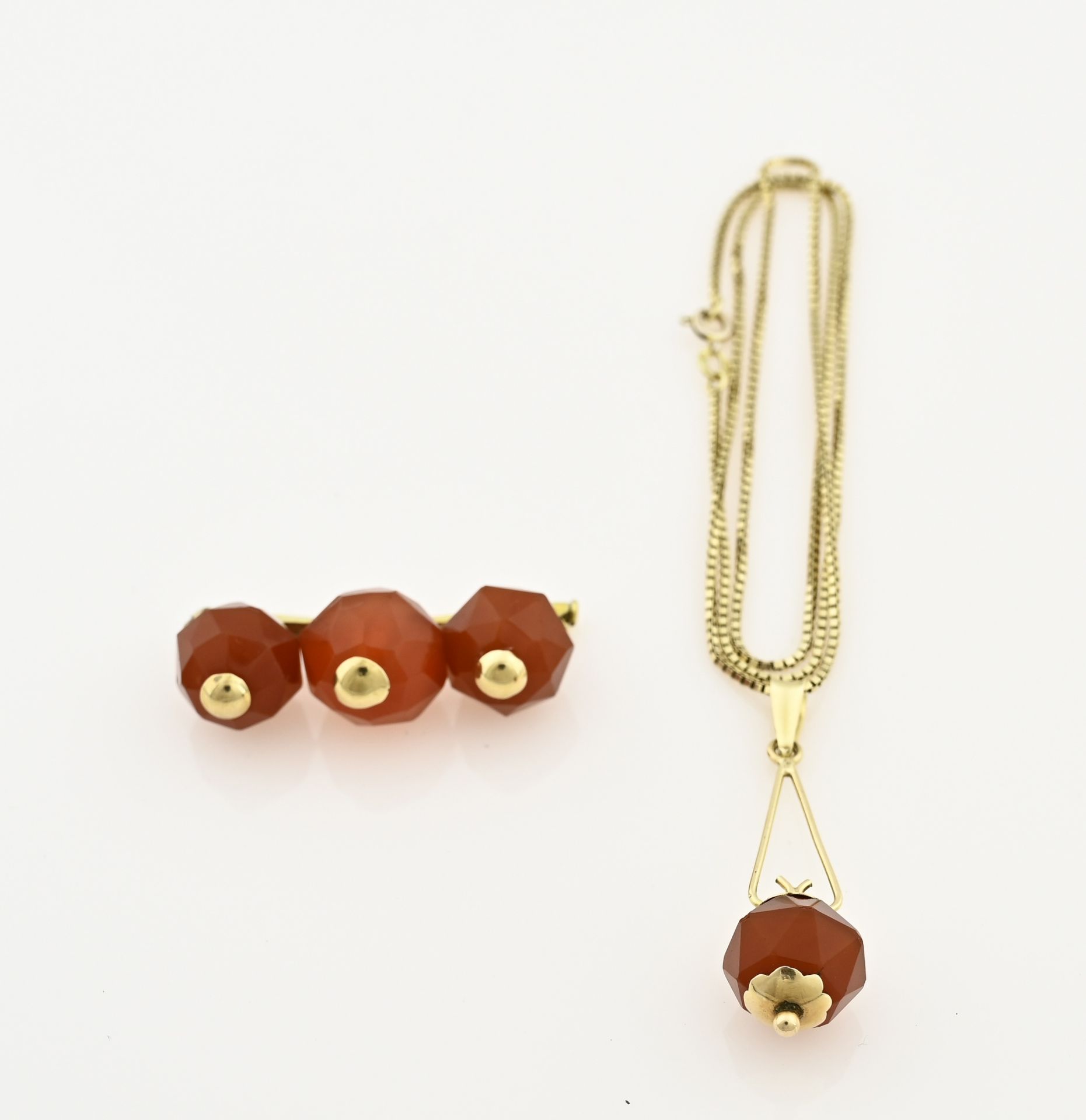 Gold necklace pendant and brooch with carnelian