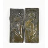 Two Mucha style wall plaques