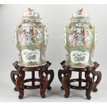 Two Chinese Cantonese lidded vases, H 44.5 x Ø 26 cm.