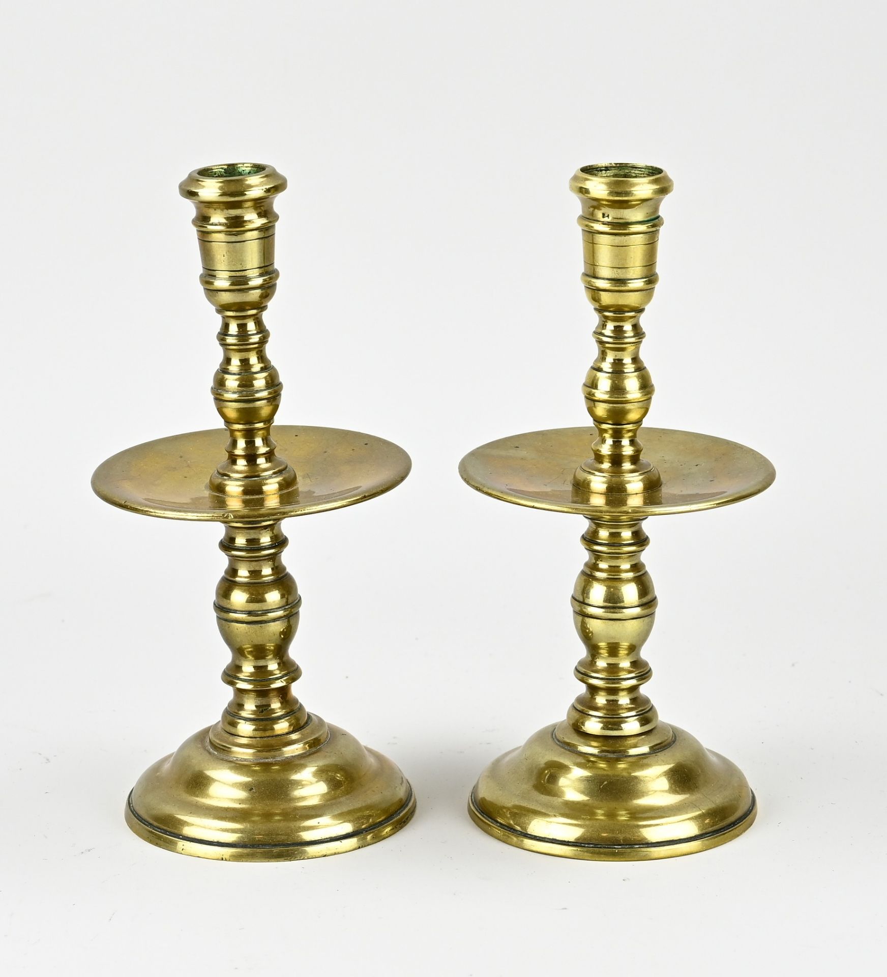 Two bronze candlesticks, H 19 cm.