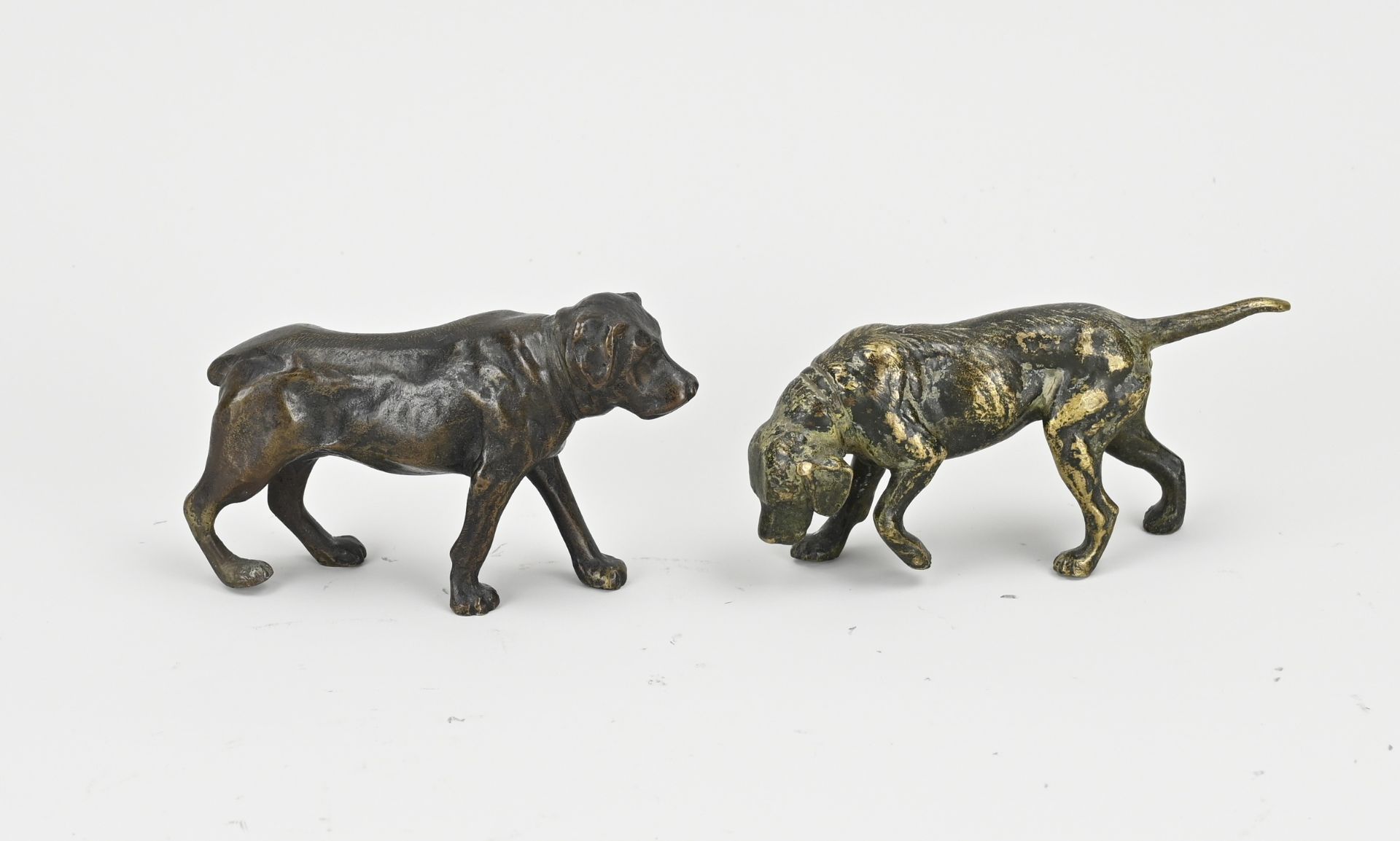 Two bronze dogs