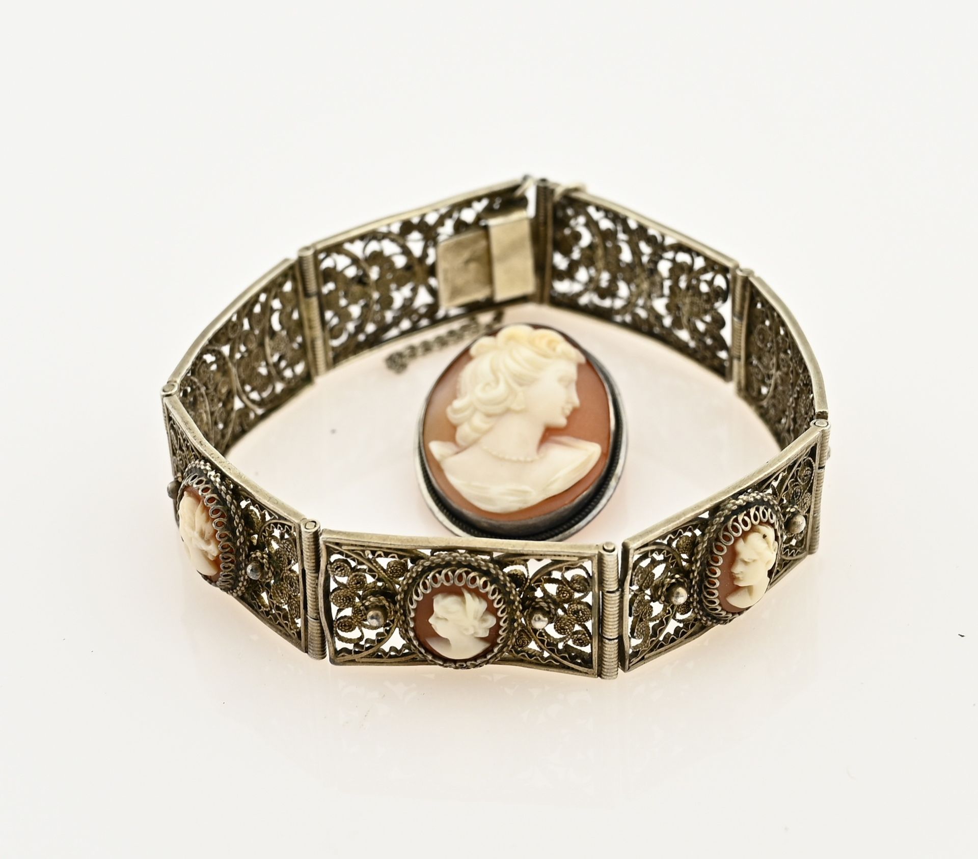 Silver brooch and bracelet with cameo