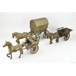 Three horses with a covered wagon