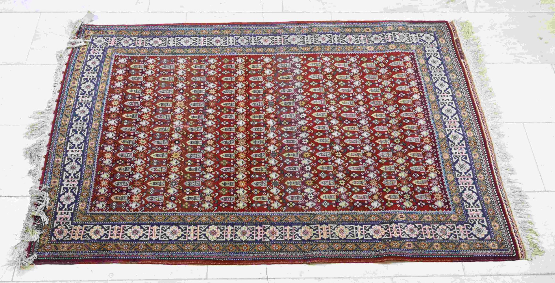 Hand-knotted rug, 171 x 110 cm.