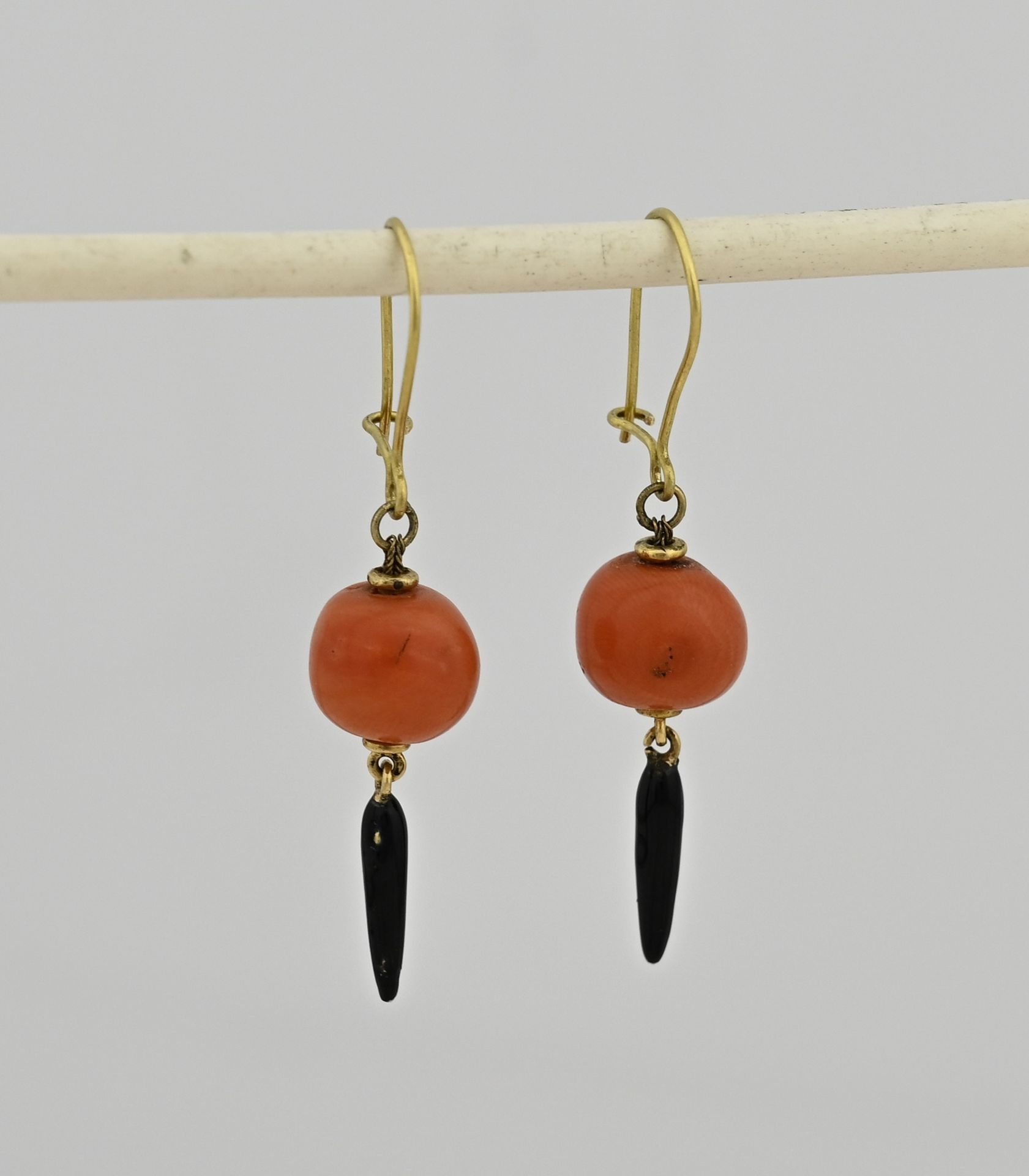 Gold earrings with red coral and enamel