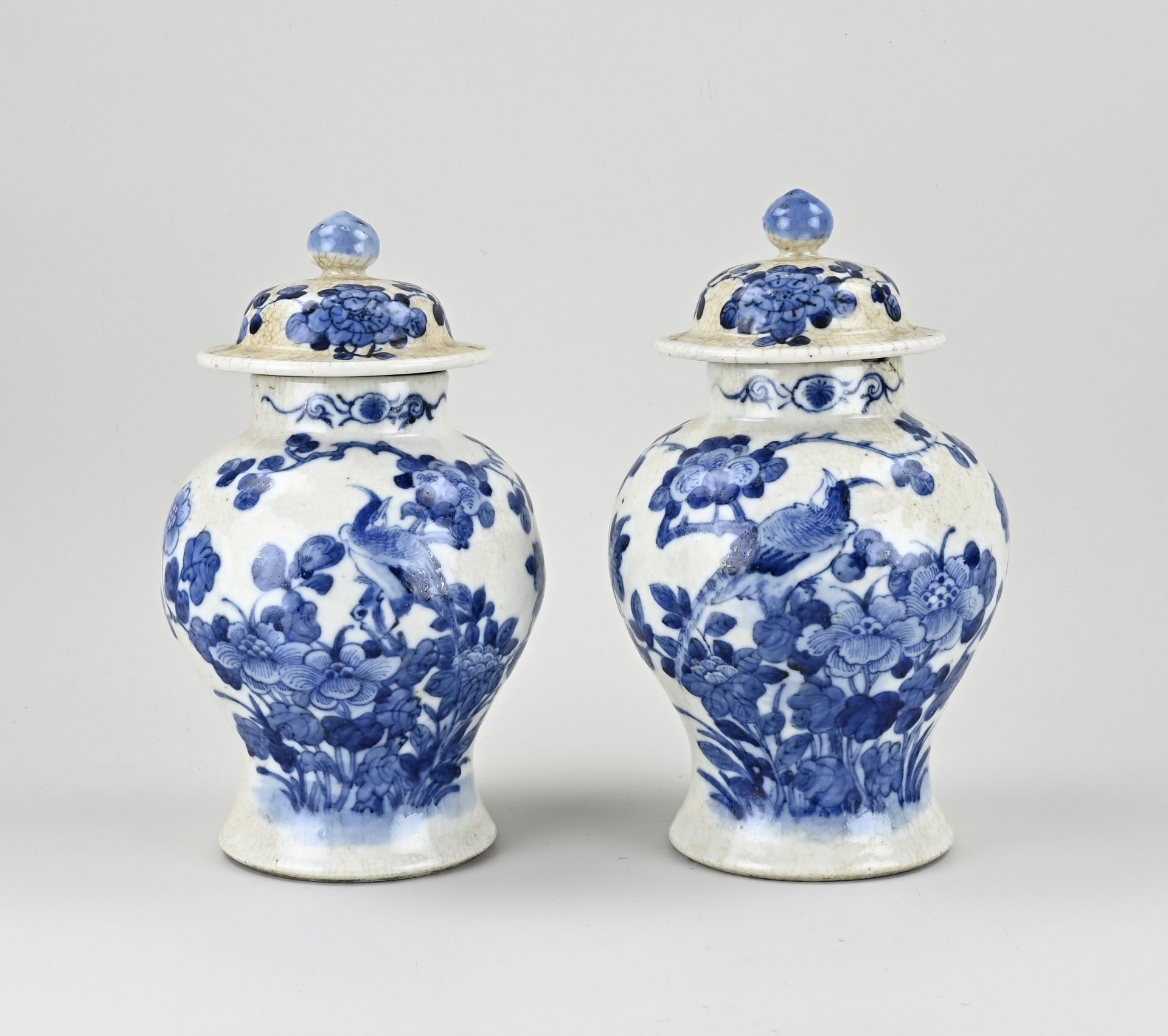 Two Chinese lidded vases, H 27 cm.