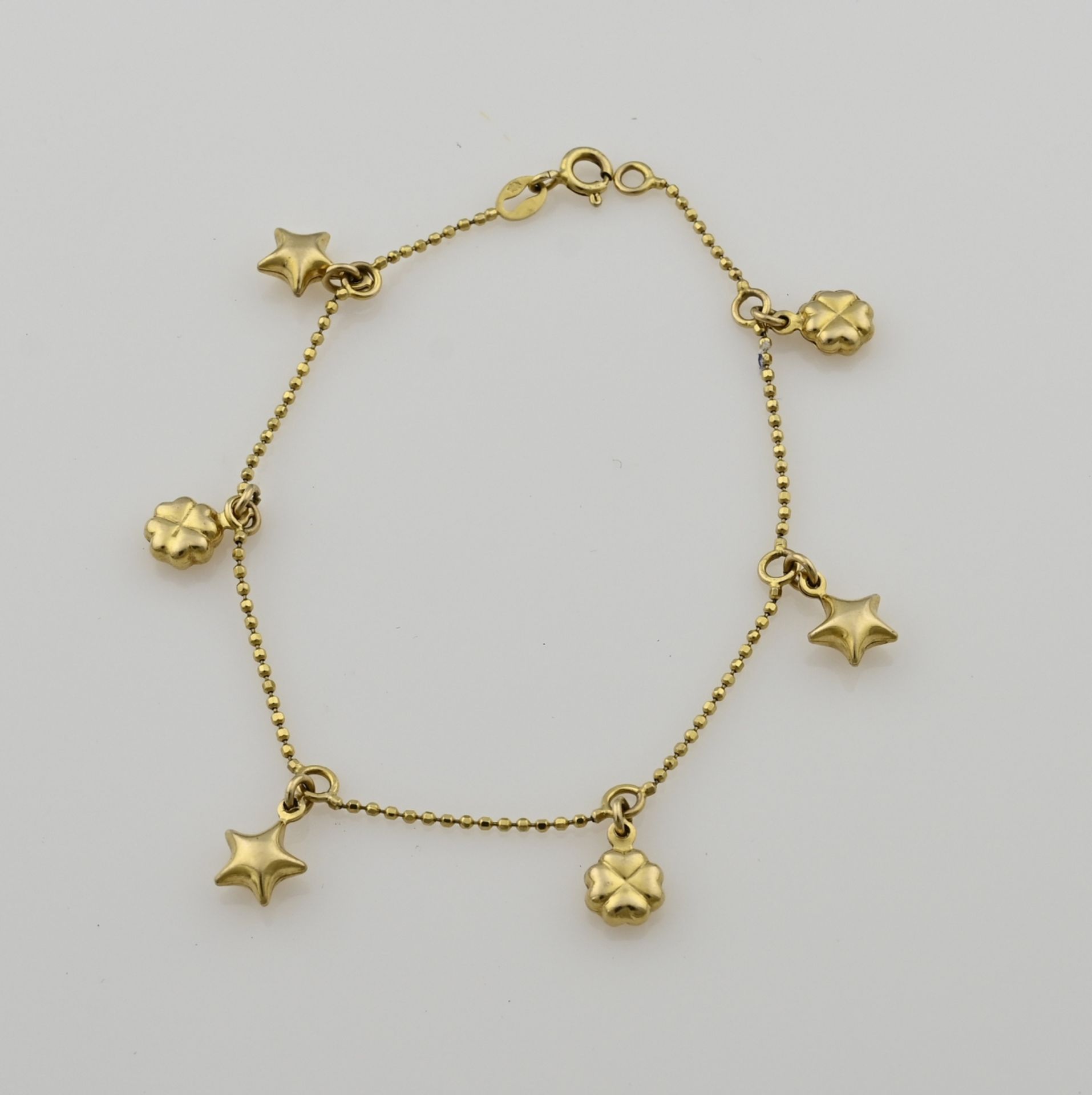 Gold charm bracelet