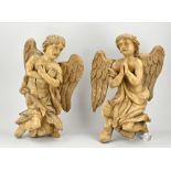 Two angels carved from linden wood