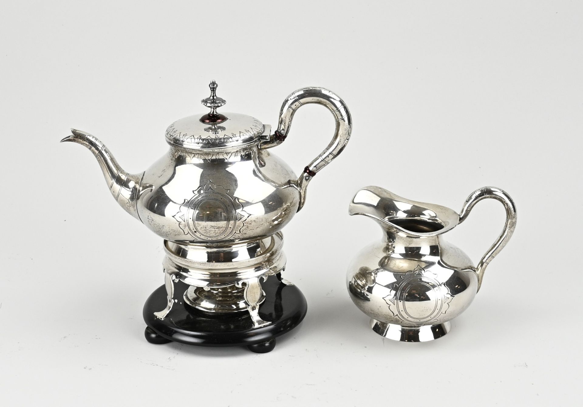 Silver tea set with stove
