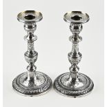 Two silver candlesticks