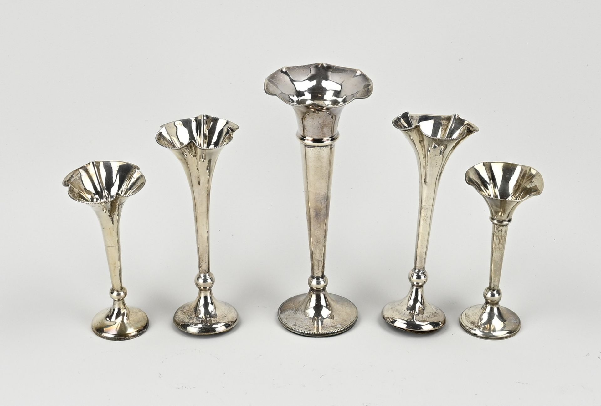 5 silver vases