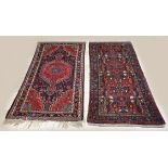 Two hand-knotted carpets
