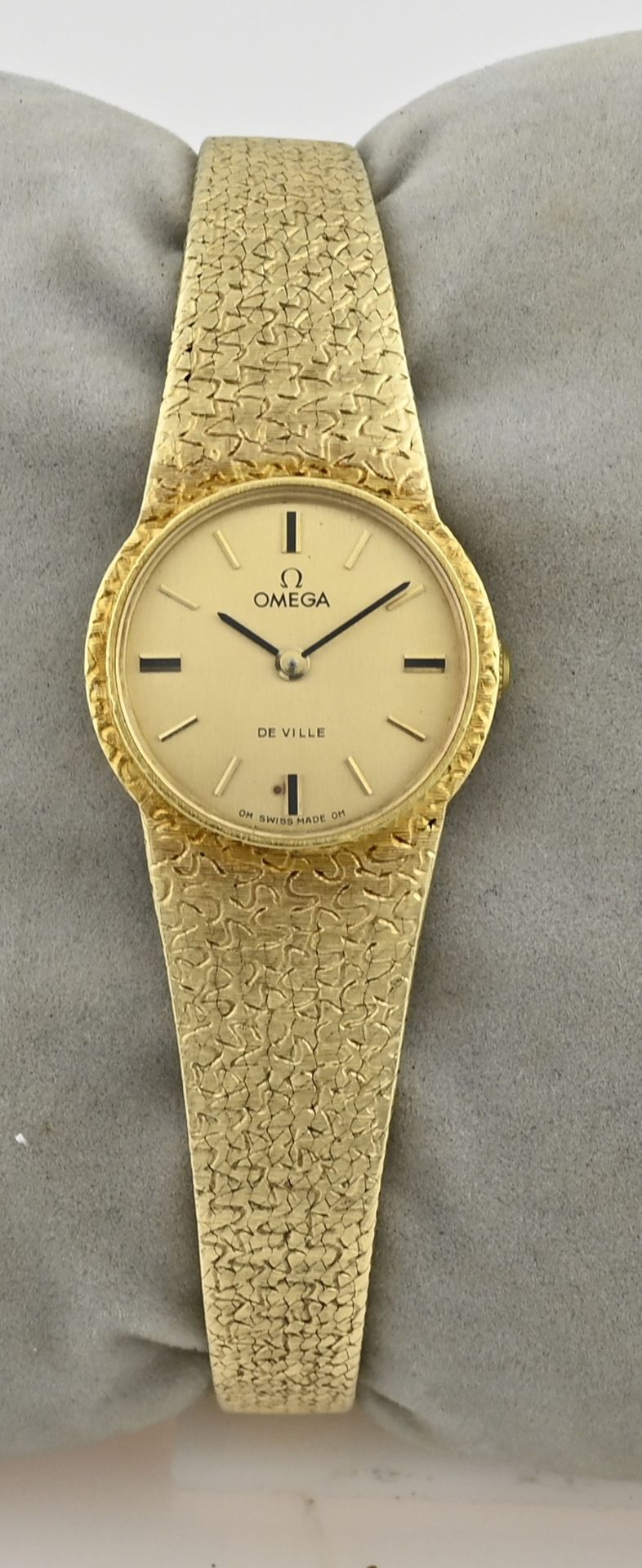 Gold Omega watch