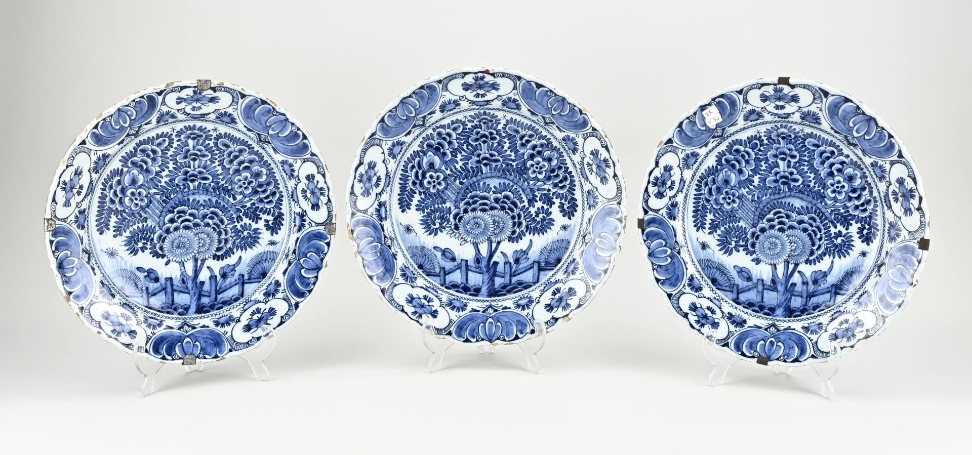 Three Delft dishes Ø 31 cm.