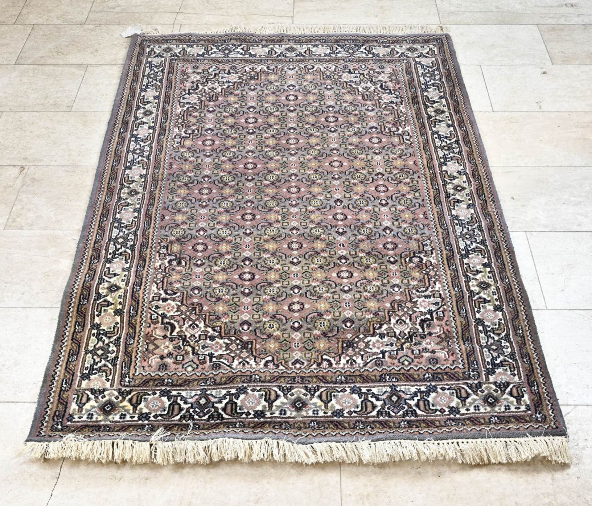 Hand-knotted Persian carpet, 188 x 127 cm.