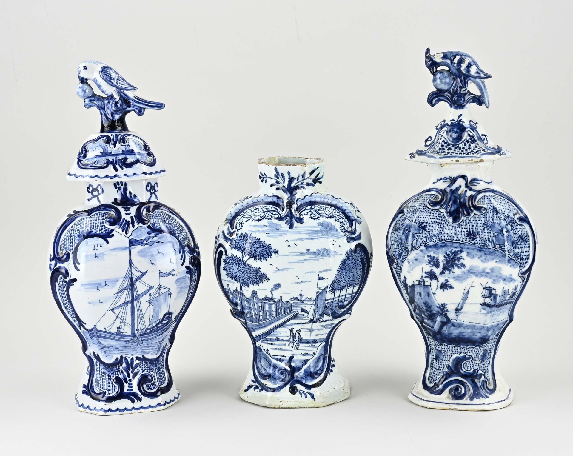 Three 18th century Delft vases, H 26 - 38 cm.