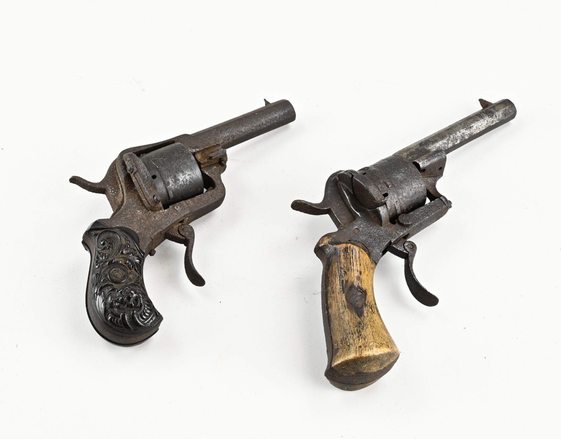 Two antique drum revolvers, L.14 - 18 cm.