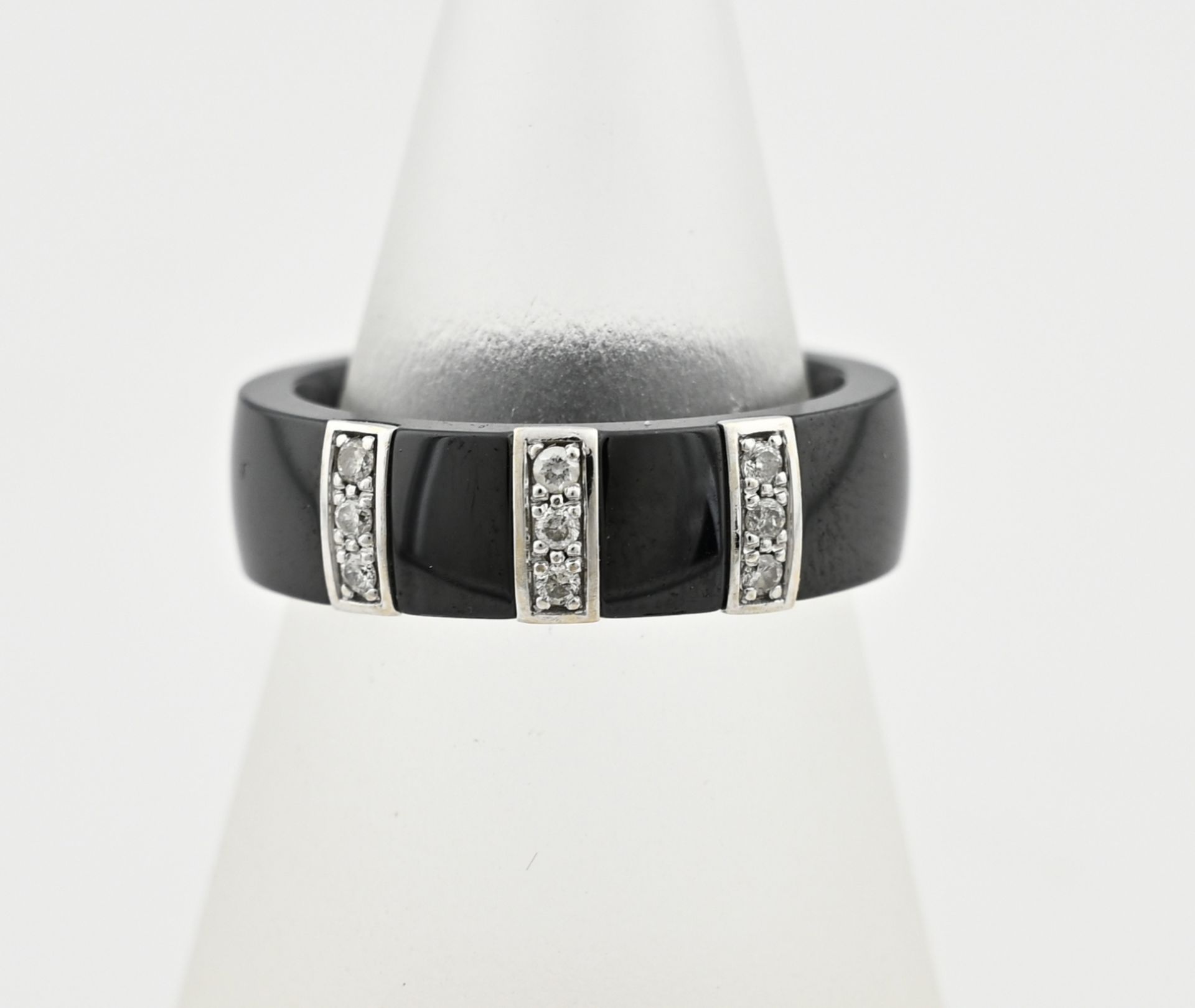 Black ceramic ring with white gold and diamond