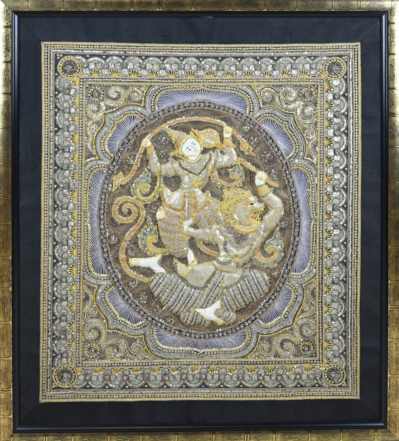 Oriental handicraft in frame